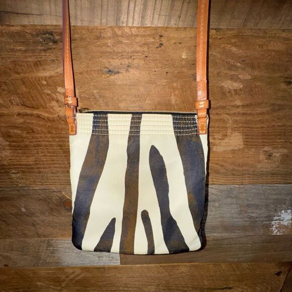 Dooney and Bourke Small Triple Zip Zebra Print Crossbody Bag
EUC - Picture 2 of 9